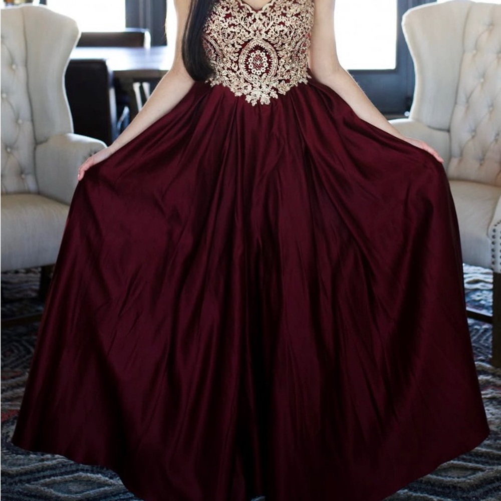 Elegant Burgundy Gown with Gold Embroidery